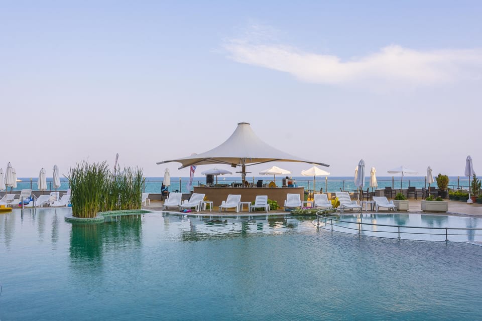 Indoor pool, seasonal outdoor pool, pool umbrellas, sun loungers