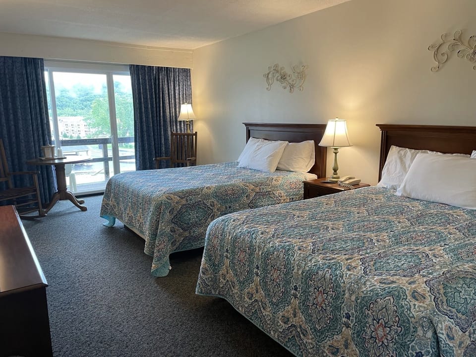 Standard Room, 2 Queen Beds, Non Smoking | Rollaway beds (surcharge), bed sheets