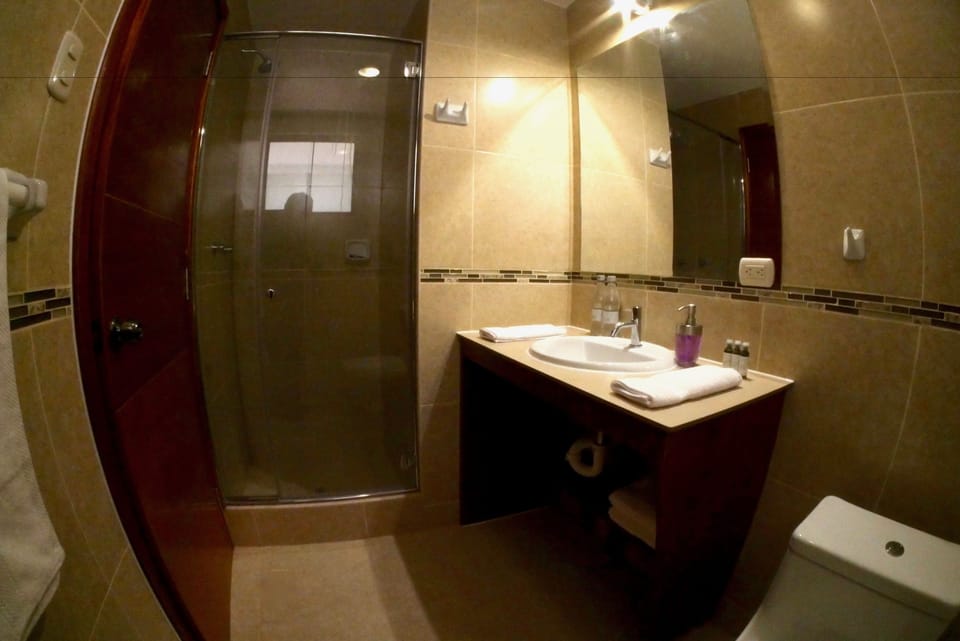 Family Twin Room | Bathroom | Shower, hair dryer, towels, soap