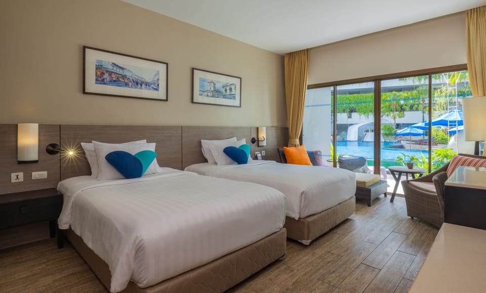 Premier Waterfront | Premium bedding, in-room safe, desk, blackout drapes