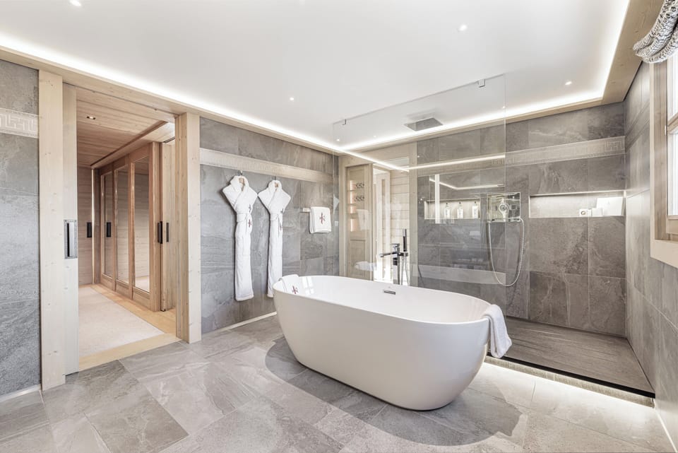Suite | Bathroom | Designer toiletries, hair dryer, bathrobes, slippers