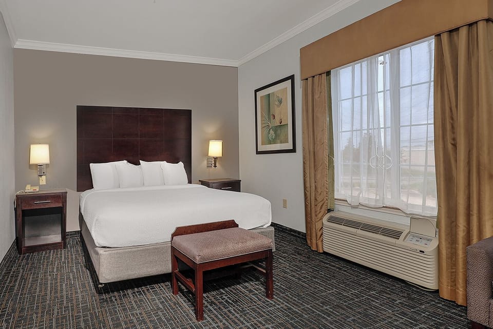 Premium bedding, desk, blackout drapes, iron/ironing board