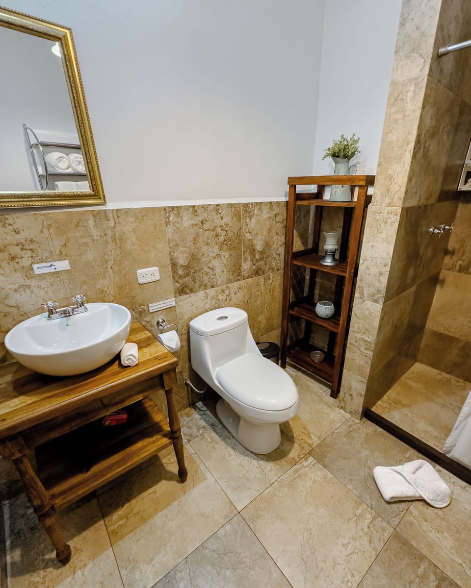 Design Room | Bathroom | Separate tub and shower, rainfall showerhead, free toiletries, towels