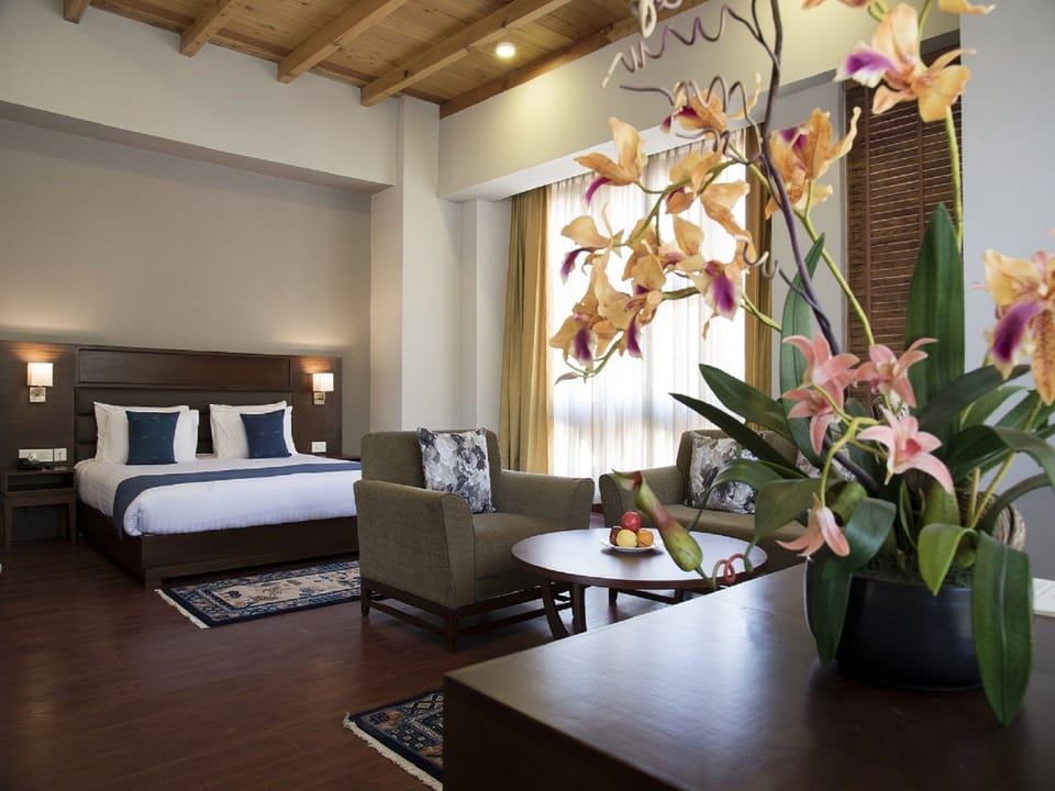 Deluxe King Room | Premium bedding, in-room safe, desk, soundproofing