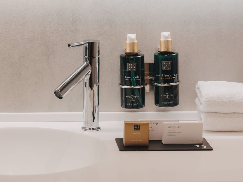 Rainfall showerhead, free toiletries, hair dryer, slippers