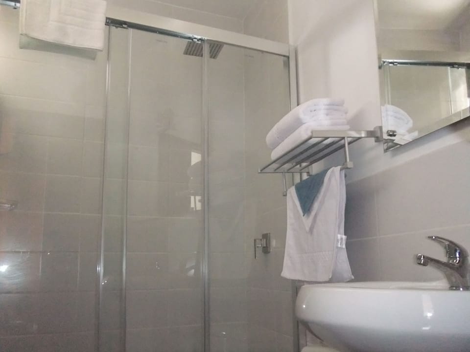 Comfort Room Water | Bathroom | Rainfall showerhead, eco-friendly toiletries, hair dryer (on request)