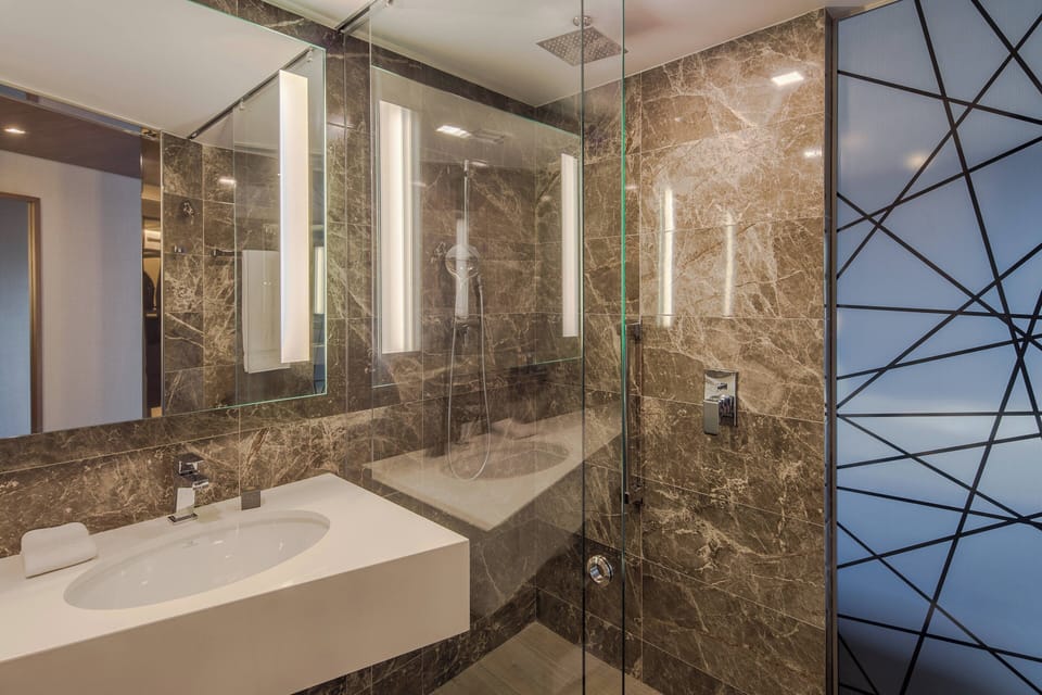 Shower, rainfall showerhead, hair dryer, heated floors