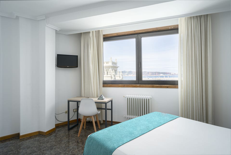 Double Room, Sea View | In-room safe, desk, blackout drapes, soundproofing