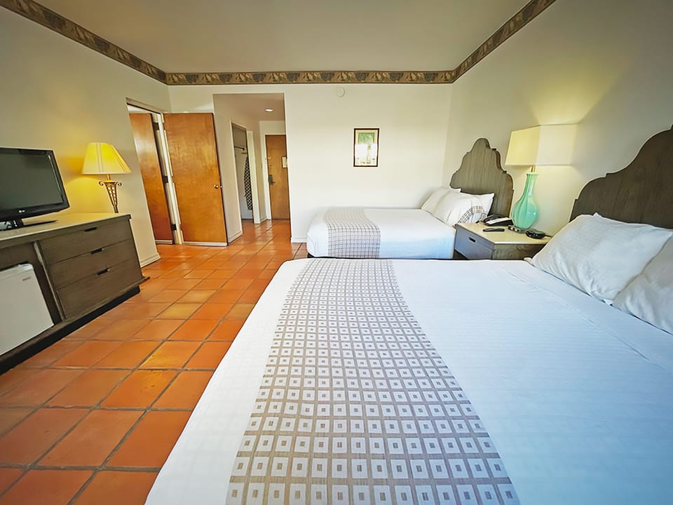 Desk, iron/ironing board, free cribs/infant beds, rollaway beds