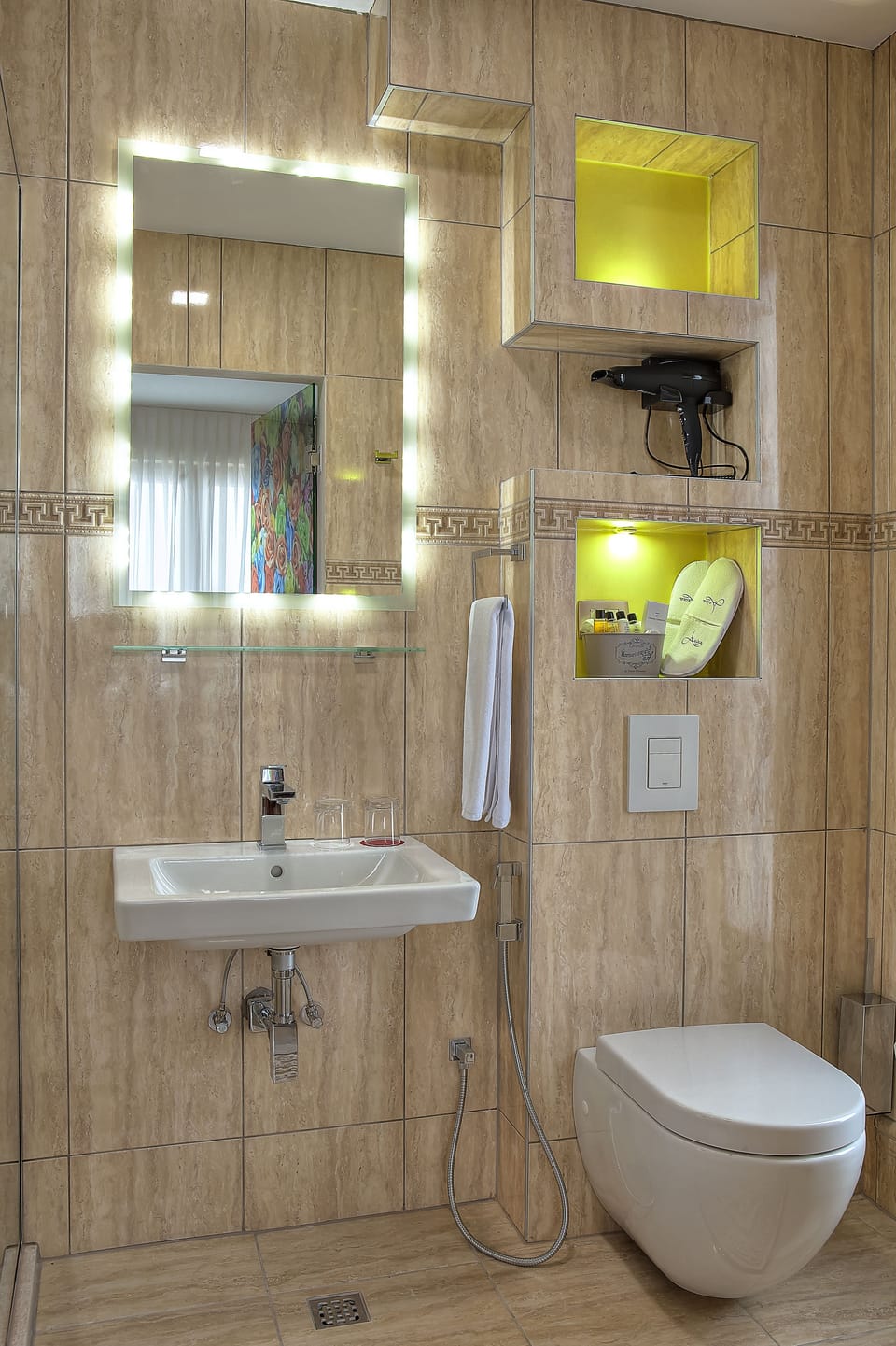 Shower, free toiletries, hair dryer, slippers