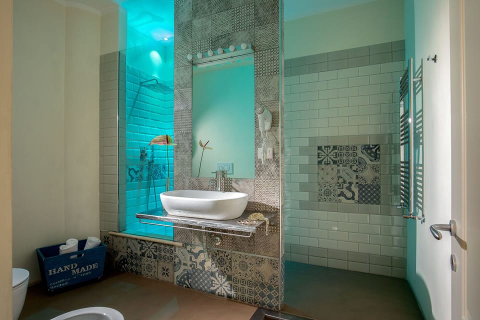 Economy Room | Bathroom | Shower, free toiletries, hair dryer, slippers