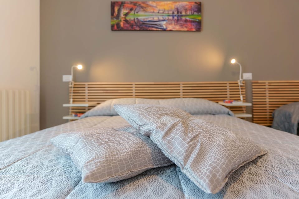 Triple Room | Down comforters, iron/ironing board, cribs/infant beds, free WiFi
