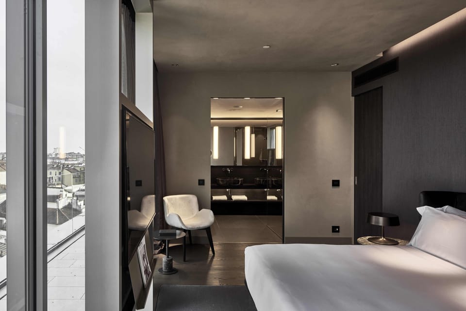 Designer toiletries, hair dryer, bathrobes, slippers
