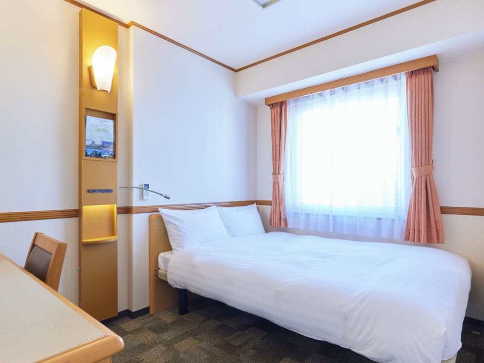 Premium bedding, desk, blackout drapes, iron/ironing board