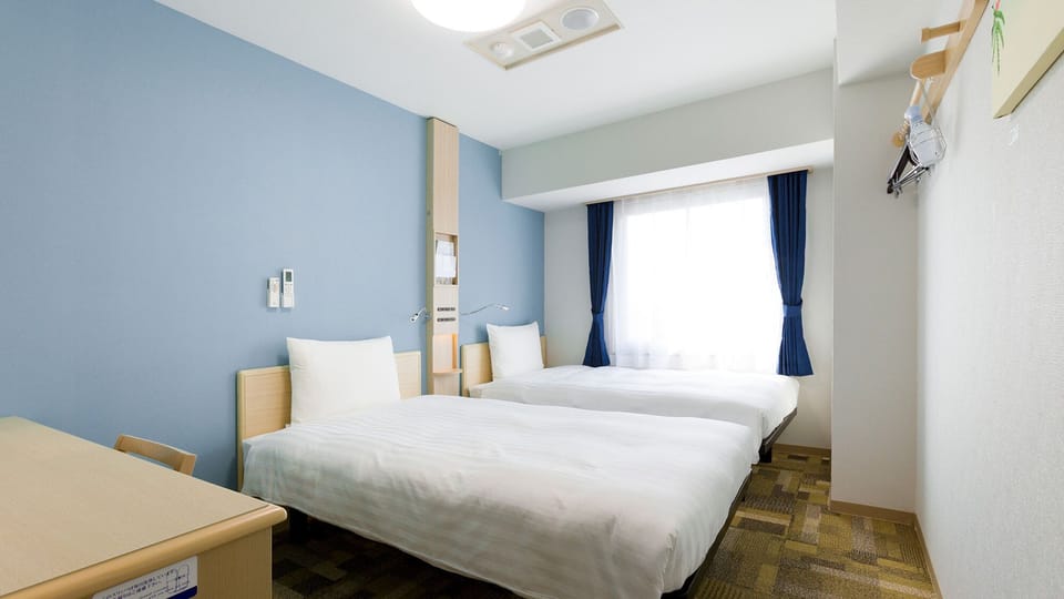 Desk, WiFi (free), bed sheets