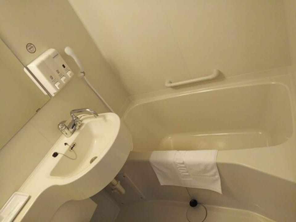 Combined shower/tub, hair dryer, bathrobes, slippers