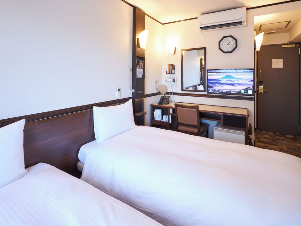 Desk, laptop workspace, free WiFi, bed sheets
