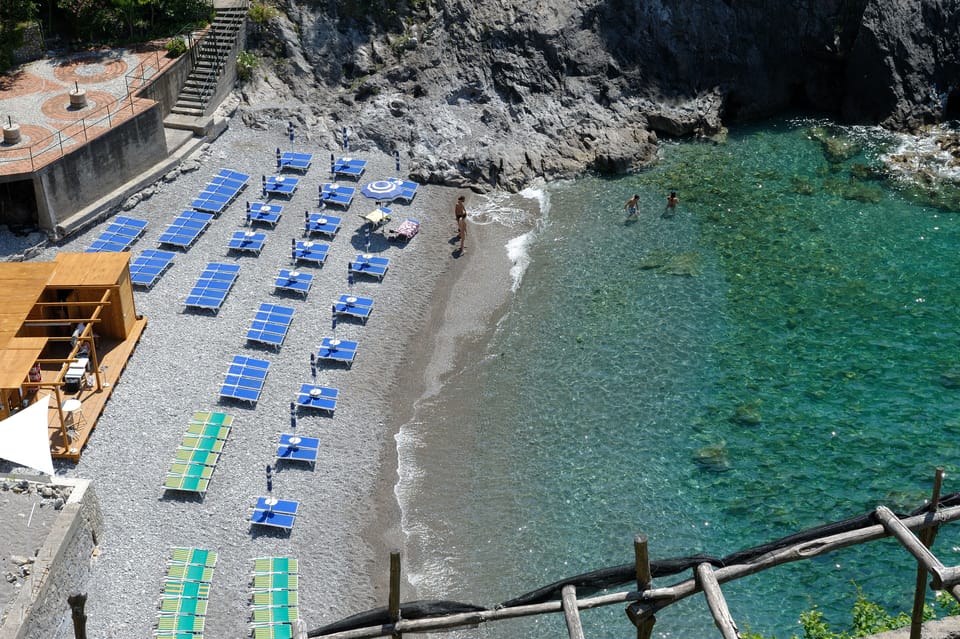 Private beach nearby, black sand