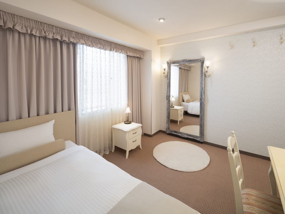 Premium bedding, in-room safe, desk, iron/ironing board (on request)