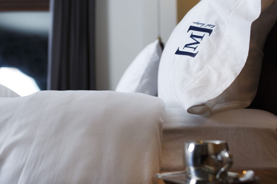 Premium bedding, down comforters, in-room safe, individually decorated