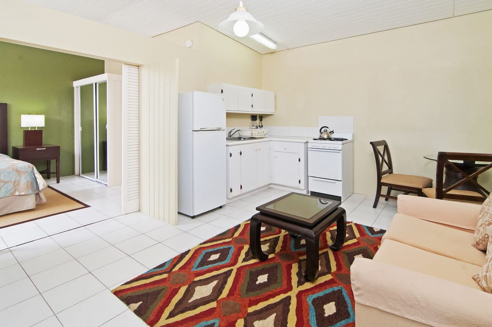 Deluxe Suite, 1 Bedroom, Kitchenette, Ocean View | Premium bedding, down comforters, in-room safe, individually furnished