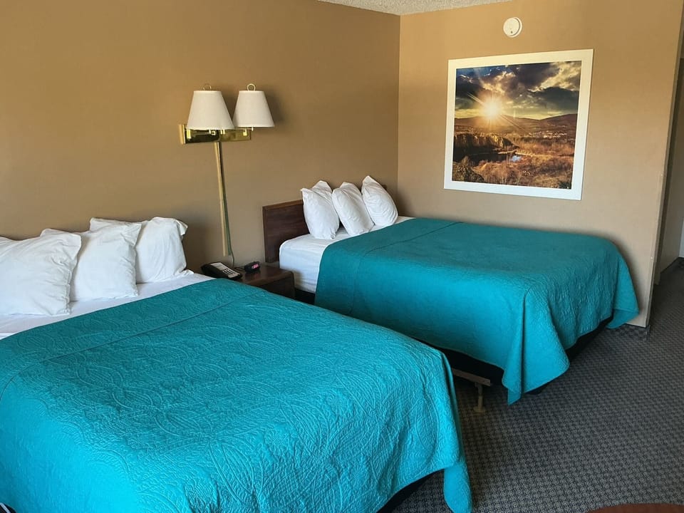 Basic Double Room, 2 Double Beds | Blackout drapes, iron/ironing board, cribs/infant beds, free WiFi