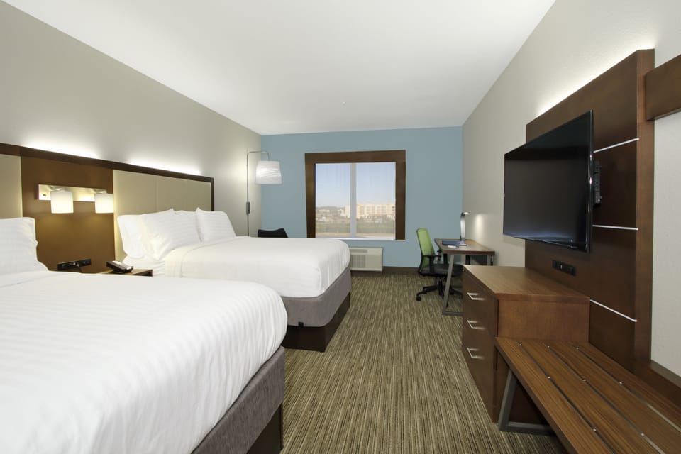 Premium bedding, individually furnished, desk, laptop workspace