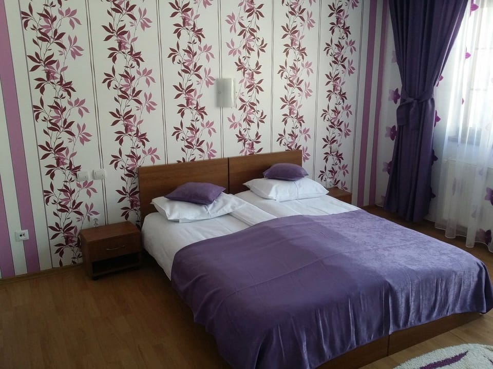 Minibar, desk, blackout drapes, iron/ironing board
