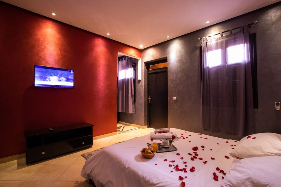 Family Room | Premium bedding, blackout drapes, free WiFi, bed sheets
