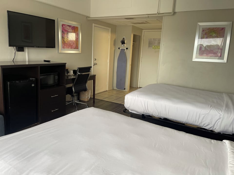 Deluxe Room, 2 Double Beds, Smoking, Refrigerator & Microwave | Iron/ironing board, WiFi (free), alarm clocks, bed sheets