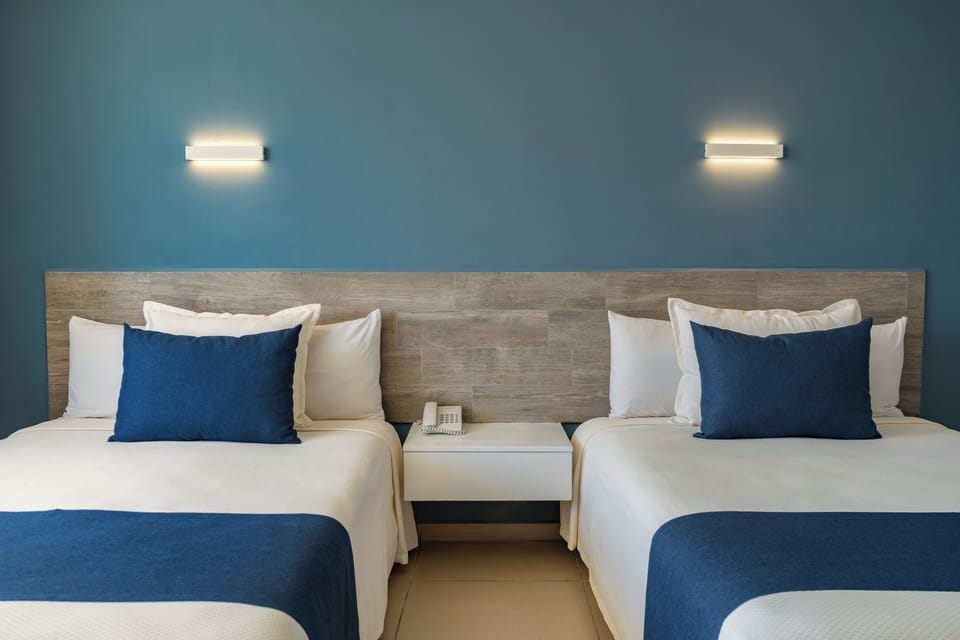 In-room safe, iron/ironing board, free cribs/infant beds, rollaway beds