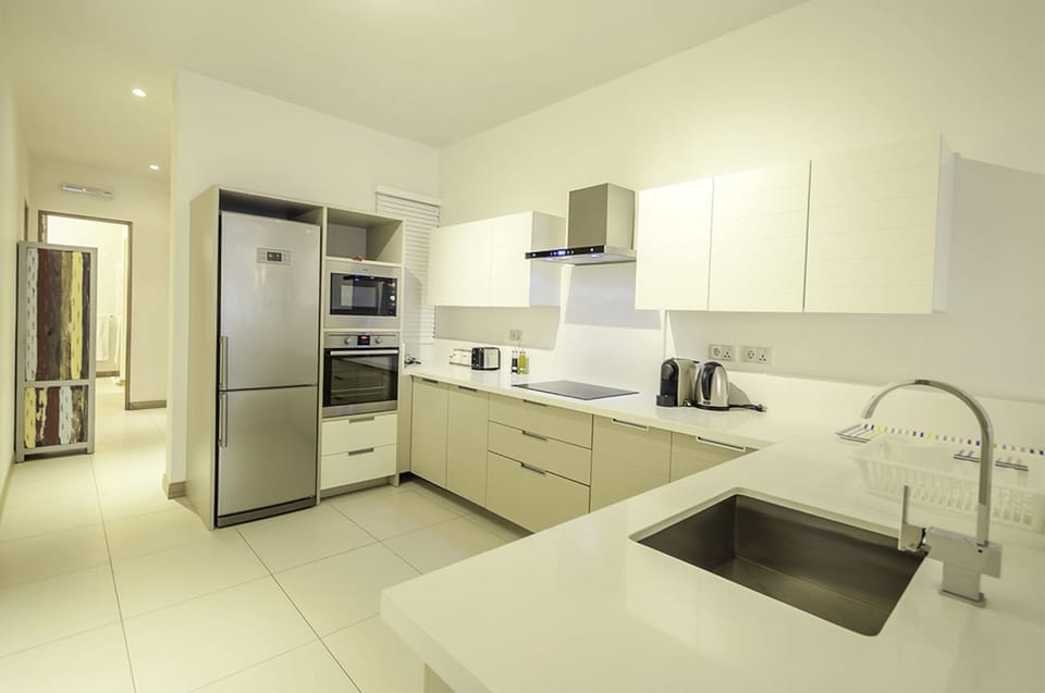 Espresso maker, full-size fridge, microwave, oven
