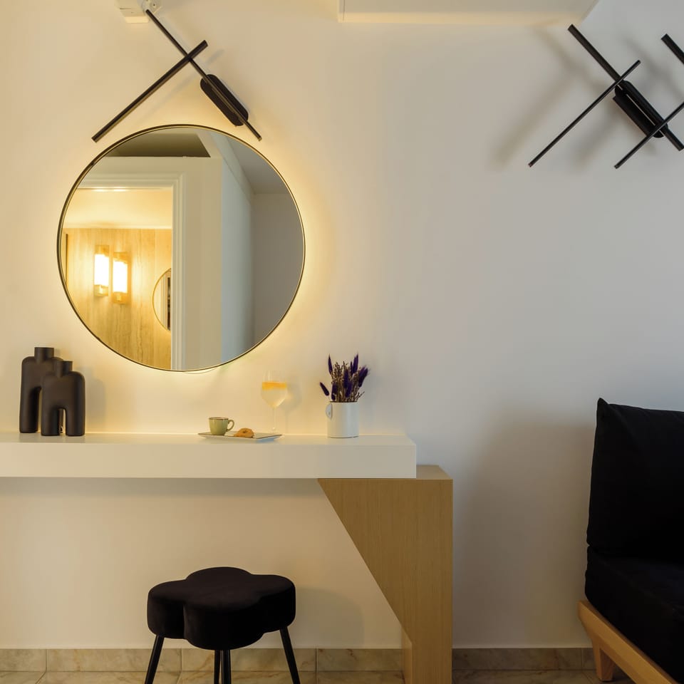 Maisonette Volcano View | Living area | 22-inch flat-screen TV with satellite channels, TV