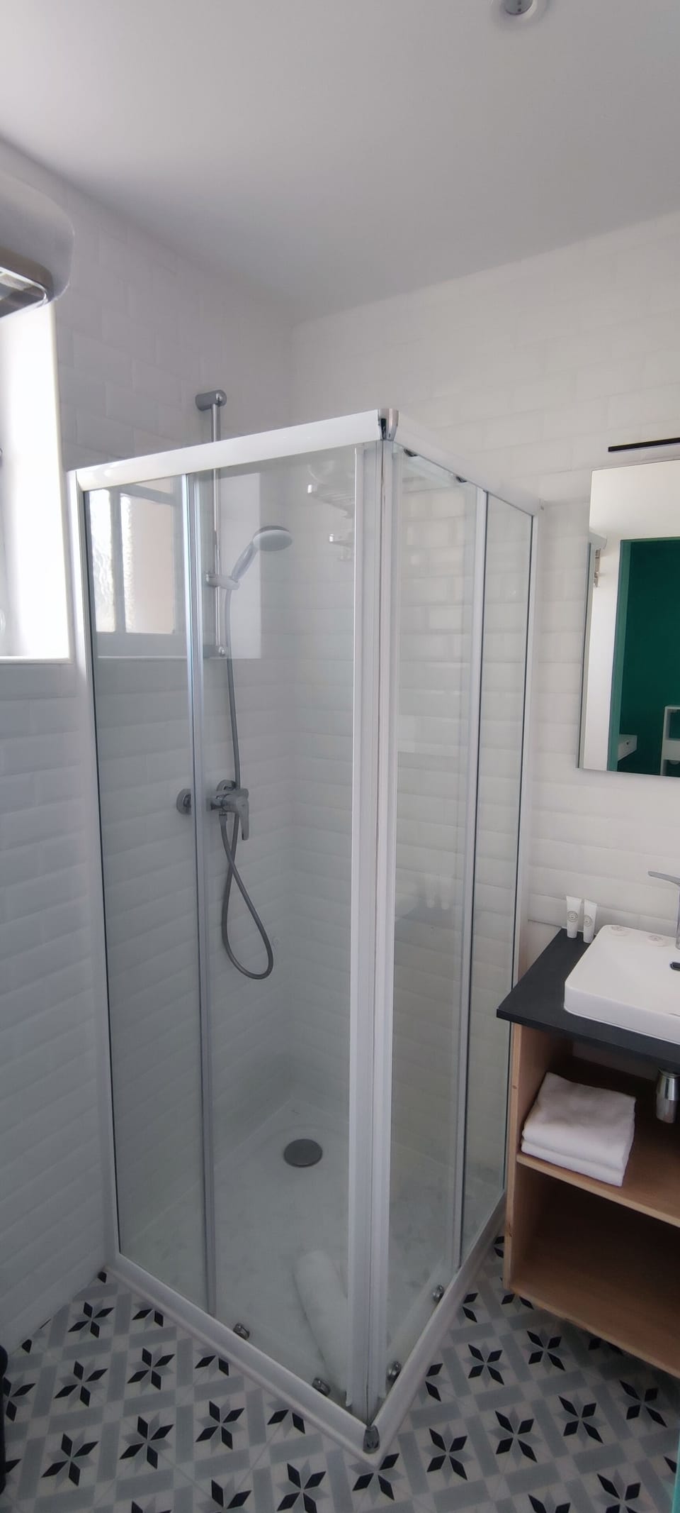 Shower, free toiletries, hair dryer, towels