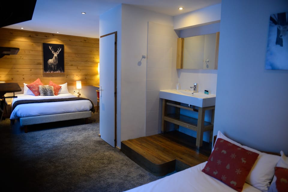 Quadruple Room | Premium bedding, in-room safe, soundproofing, free WiFi