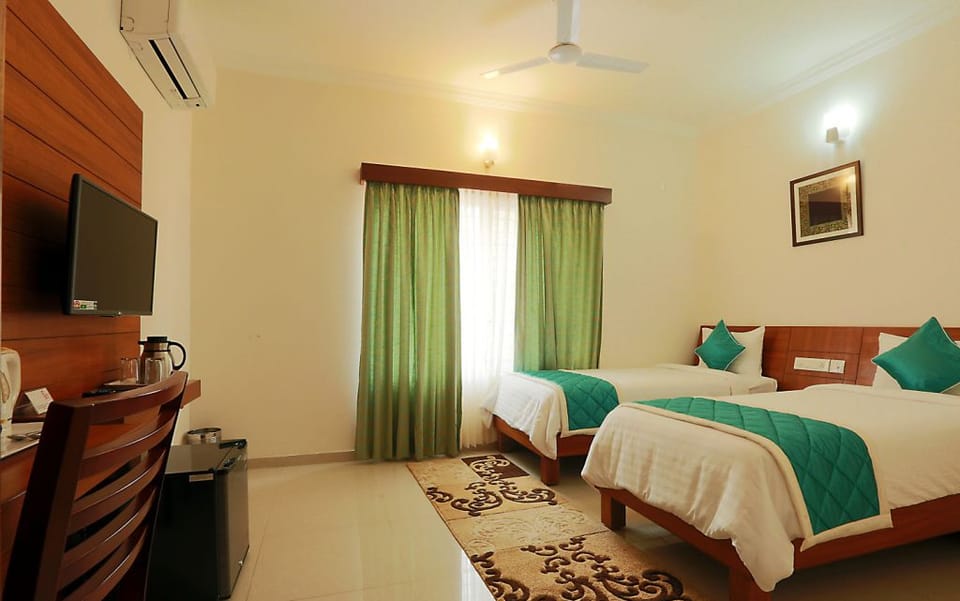 Business Single Room, 1 Bedroom, Accessible, Pool View | Minibar, in-room safe, desk, iron/ironing board