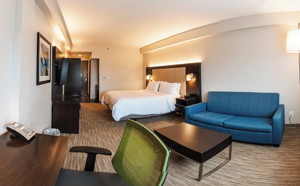Suite, 1 King Bed | Down comforters, pillowtop beds, in-room safe, desk