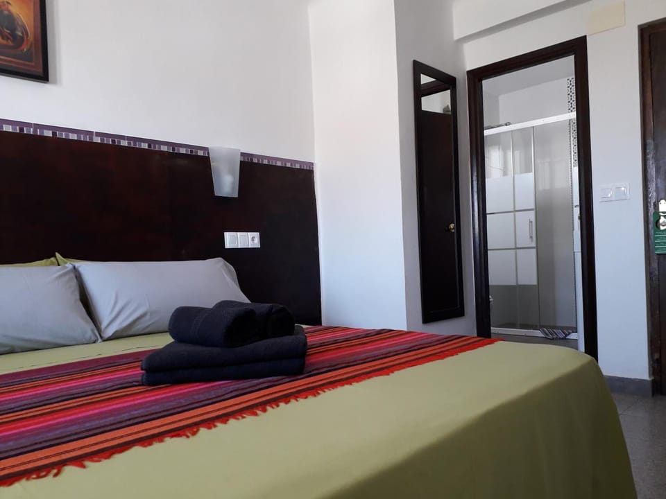 Desk, blackout drapes, WiFi (free), bed sheets