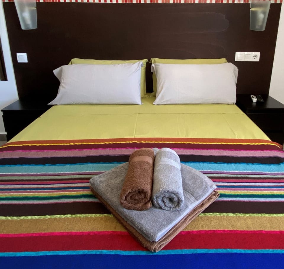 Desk, blackout drapes, WiFi (free), bed sheets