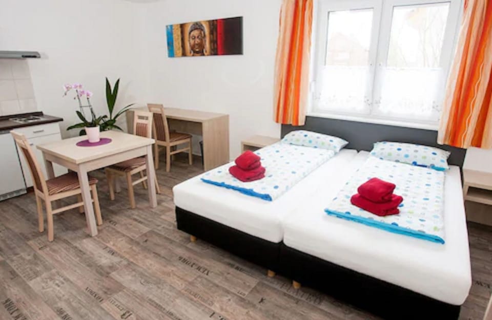 Double Room, Kitchenette | Desk, blackout drapes, iron/ironing board, rollaway beds