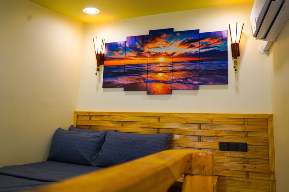 Family Room | 1 bedroom, premium bedding, minibar, in-room safe