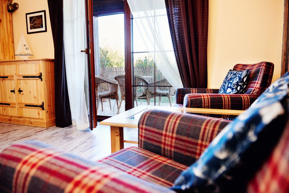 Exclusive Apartment | Living area | 32-inch TV with digital channels