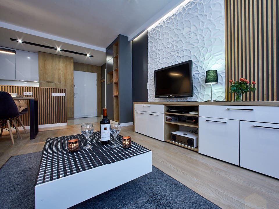 Comfort Apartment, 1 Bedroom, Balcony | Living area | Flat-screen TV