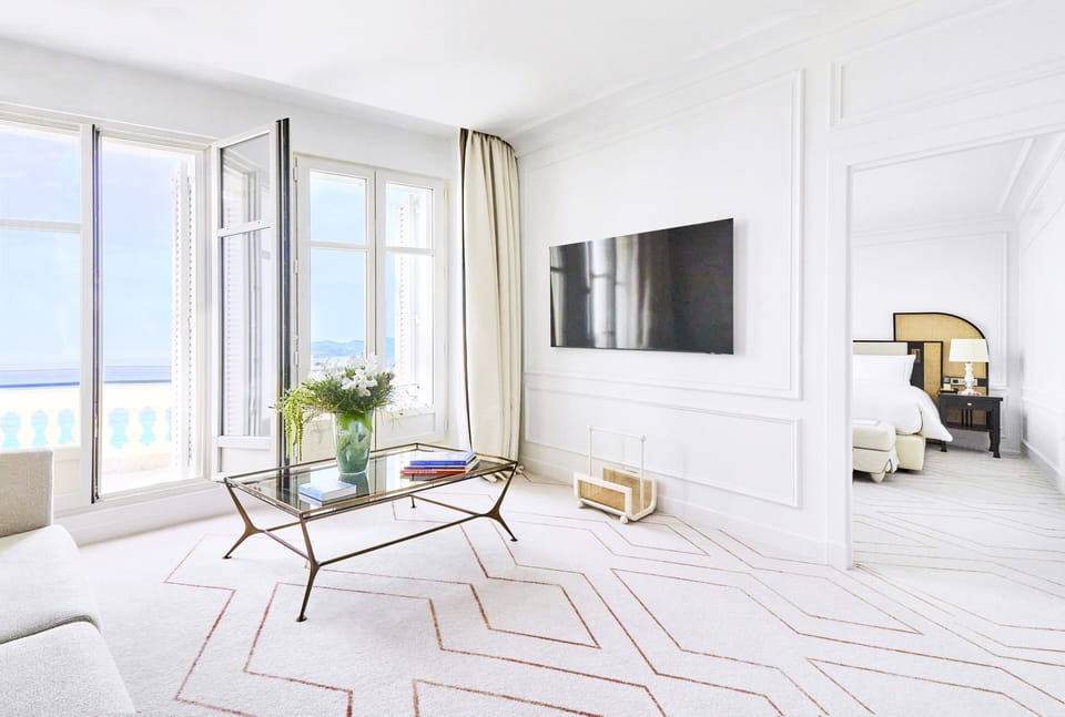 Premium bedding, down comforters, free minibar items, in-room safe