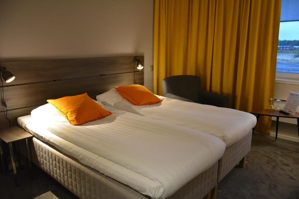 Blackout drapes, soundproofing, iron/ironing board (on request)