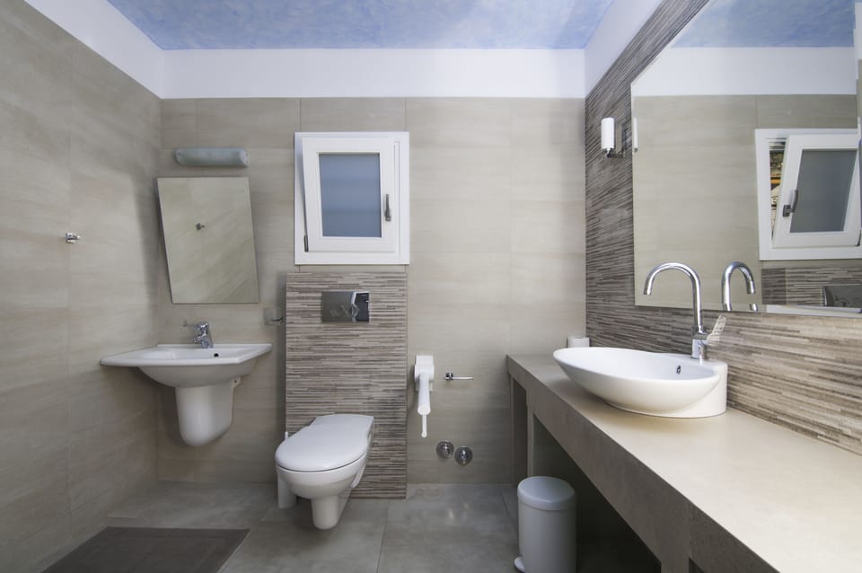 Quadruple Room, Sea View | Bathroom | Shower, free toiletries, hair dryer, towels