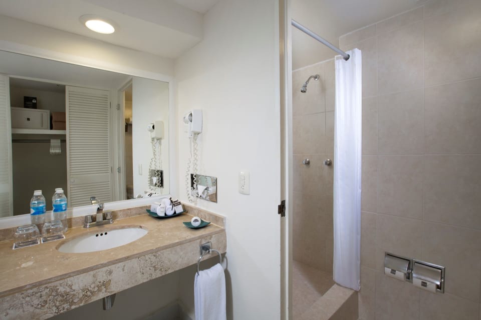 Shower, free toiletries, hair dryer, towels