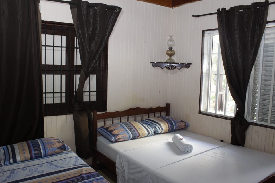 Basic Quadruple Room, Private Bathroom | In-room safe, free WiFi, bed sheets