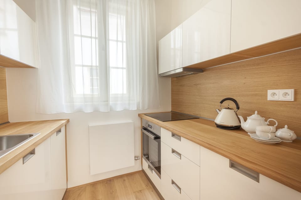 Luxury Suite, 1 Bedroom, Kitchen | Private kitchen | Coffee/tea maker