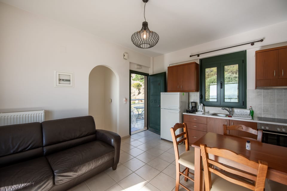 Comfort Suite, 1 Bedroom, Sea View (2nd Floor) | Private kitchen | Espresso maker, coffee/tea maker, full-size fridge, oven